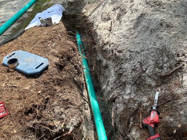 "Professional plumber running a new gas or sewer line in a 30A Florida home - expert plumbing services for Santa Rosa Beach, Seaside, Watercolor, Seagrove, and surrounding areas."